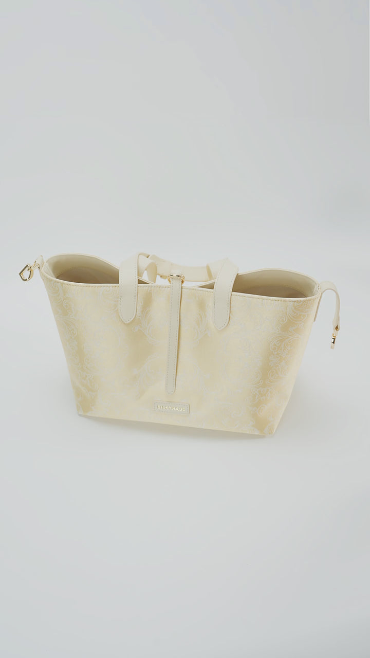 Interior capacity guide for Silkyhaus gold brocade tote bag, showing spacious internal structure and daily storage space