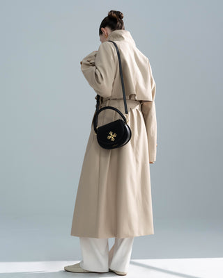 Black Leather Crown Handbag worn on shoulder on a model, genuine leather crown handbag by Silkyhaus
