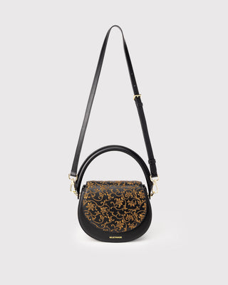 Black scroll pattern embroidered crossbody bag with long leather strap