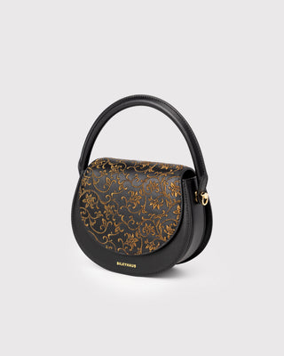 Black scroll pattern embroidered top handle bag, 45-degree view